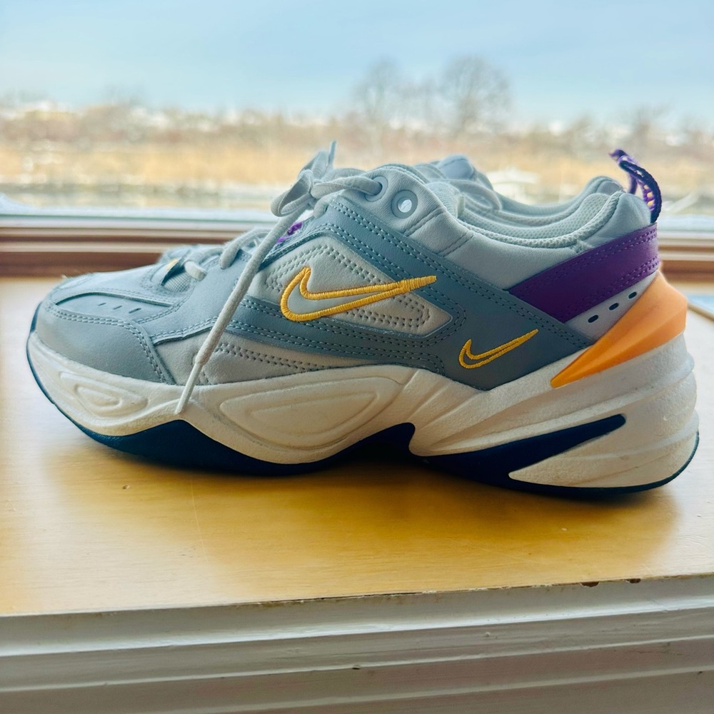 Nike Gray Sneakers with Gold and Orange Details